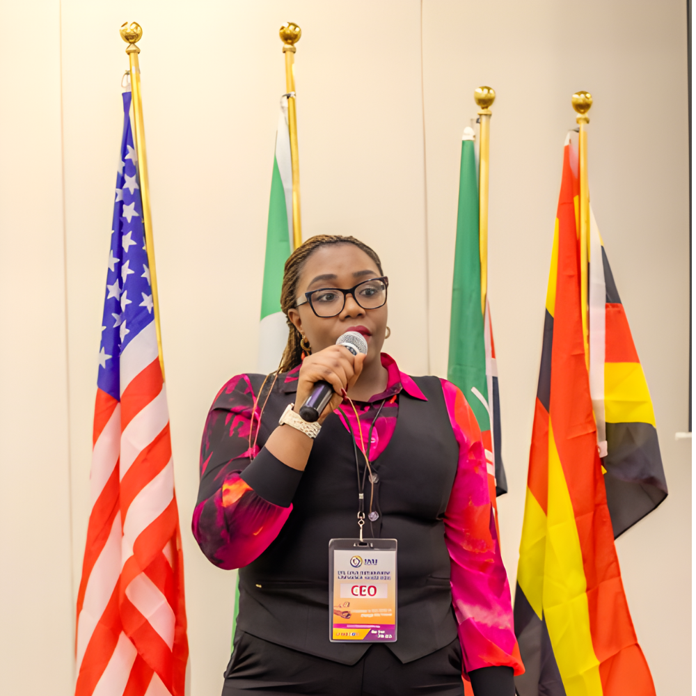 A TAGI conference speaker addressing participants during an international community event